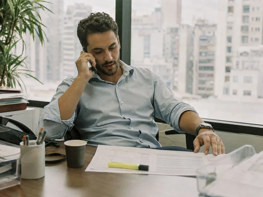 A colleague following up by phone with records close at hand