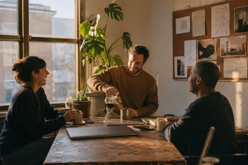 A team working together around a shared table